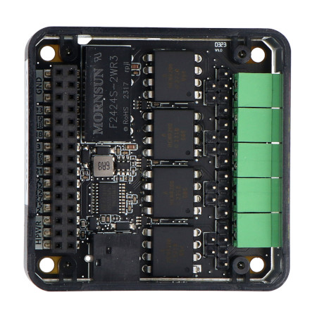 The black M5Stack analog to digital converter is inverted and lies on a white background.