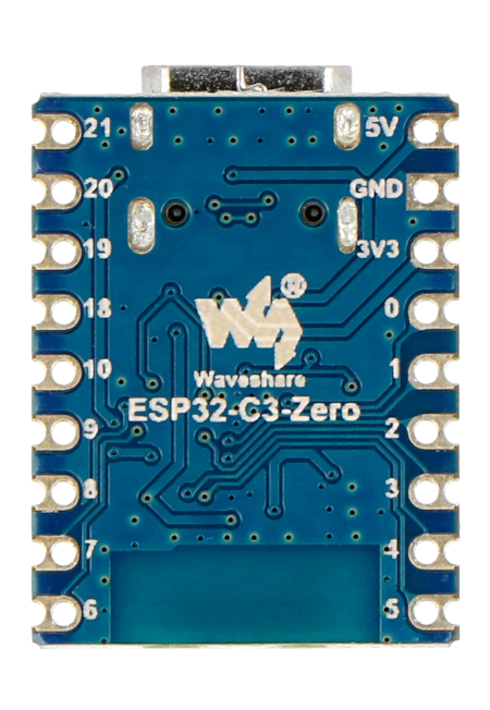 A blue mini development board lies upside down on a white background.